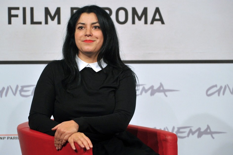 (FILES) Iranian writer and film director Marjane Satrapi poses during the photocall of her latest film "La bande des Jotas" (Gang of the Jotas) in Rome, on November 16, 2012 during the seventh edition of the Rome film festival. The Franco-Iranian artist Marjane Satrapi, who gained worldwide recognition with the graphic novel and film "Persepolis," has died at the age of 56, AFP learned on June 4, 2026 from her relatives. (Photo by TIZIANA FABI / AFP)